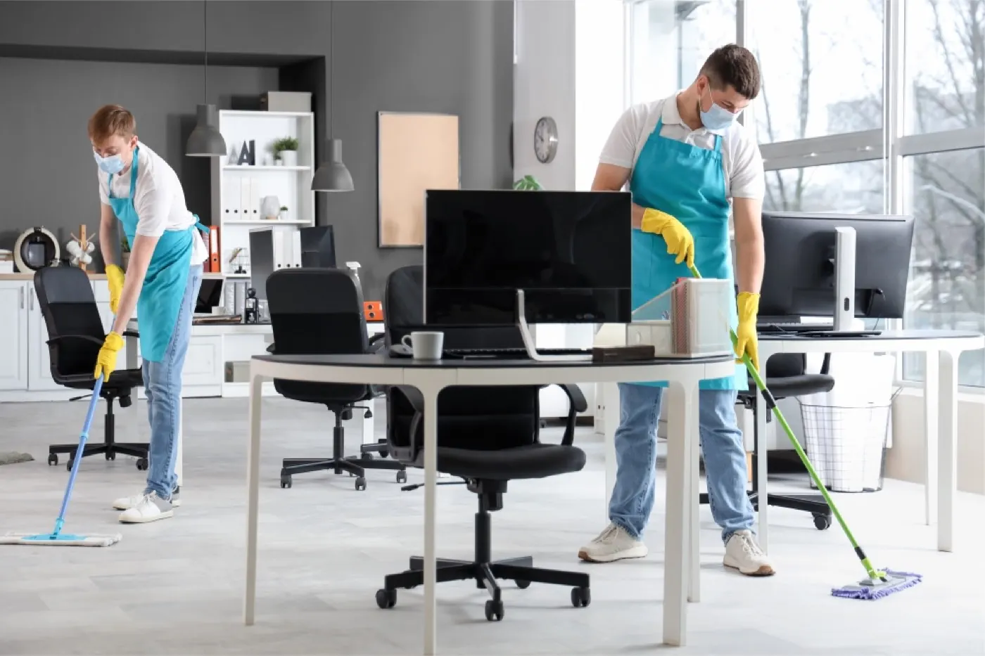 Commercial cleaner maintaining a bright office workspace