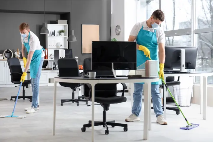 Commercial cleaner maintaining an office space